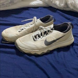 Nike golf shoes. Men’s size 7.5,Women’s 9